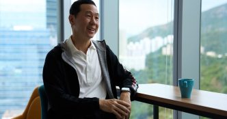 Animoca's Evan Auyang tours CoinDesk around its new office in Hong Kong. (Chris Lam/CoinDesk)