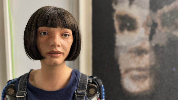 'AI God' portrait of Alan Turing by Aida humanoid robot