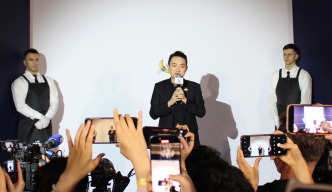 Justin Sun eats the world's most expensive banana at an event in Hong Kong.