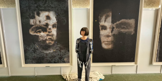 'AI God' portrait of Alan Turing by Aida humanoid robot