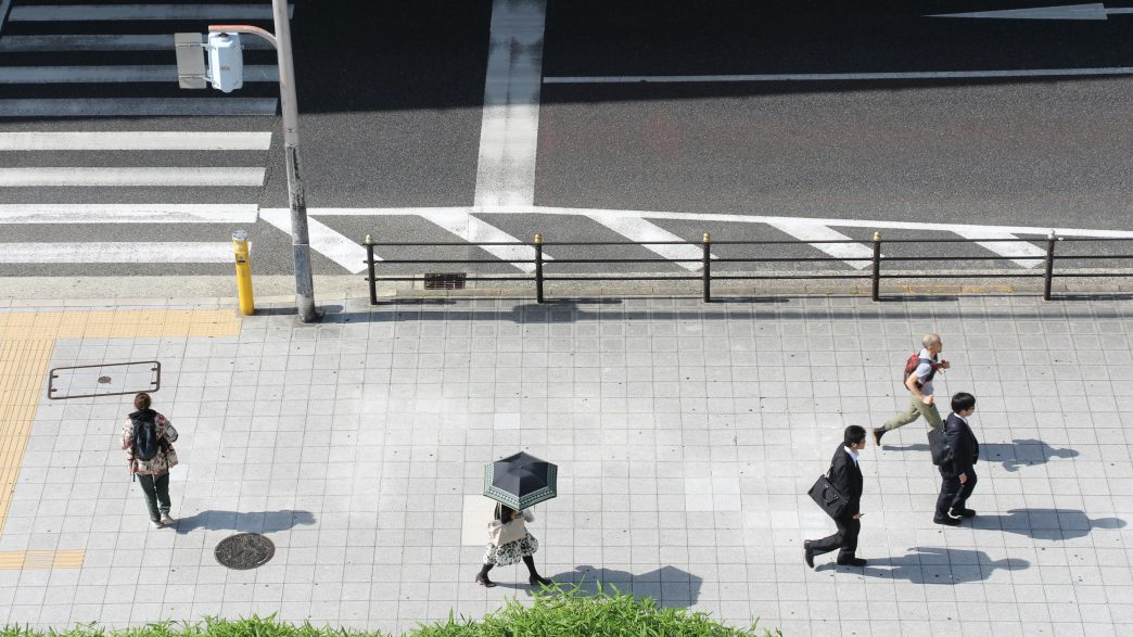 Pedestrians on sidewalk