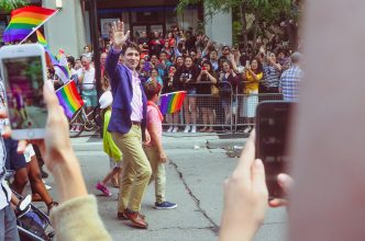 Canadian Prime Minister Justin Trudeau at a 2017 Pride Parade (Joy Real/Unsplash)